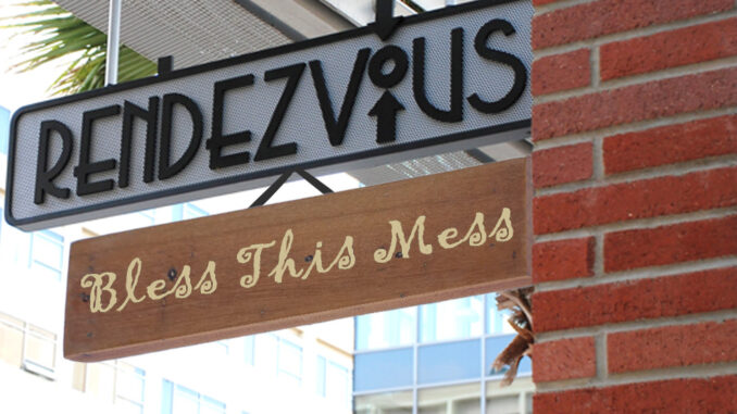 Rendezvous sign with additional sign that says "Bless this mess"